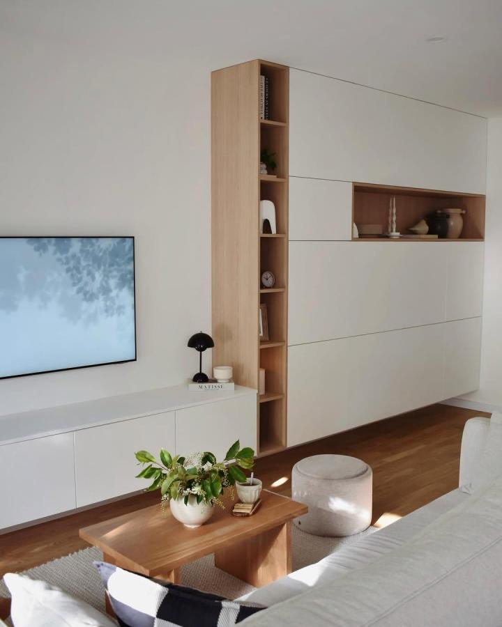 White-and-oak living room ikea besta built in ideas from @millennials.nest. Slim shelving and recessed display niche.