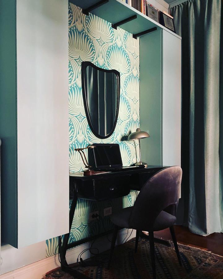 Teal home office divider from @jane_does_interiors. SANELA curtain frames a compact desk nook.