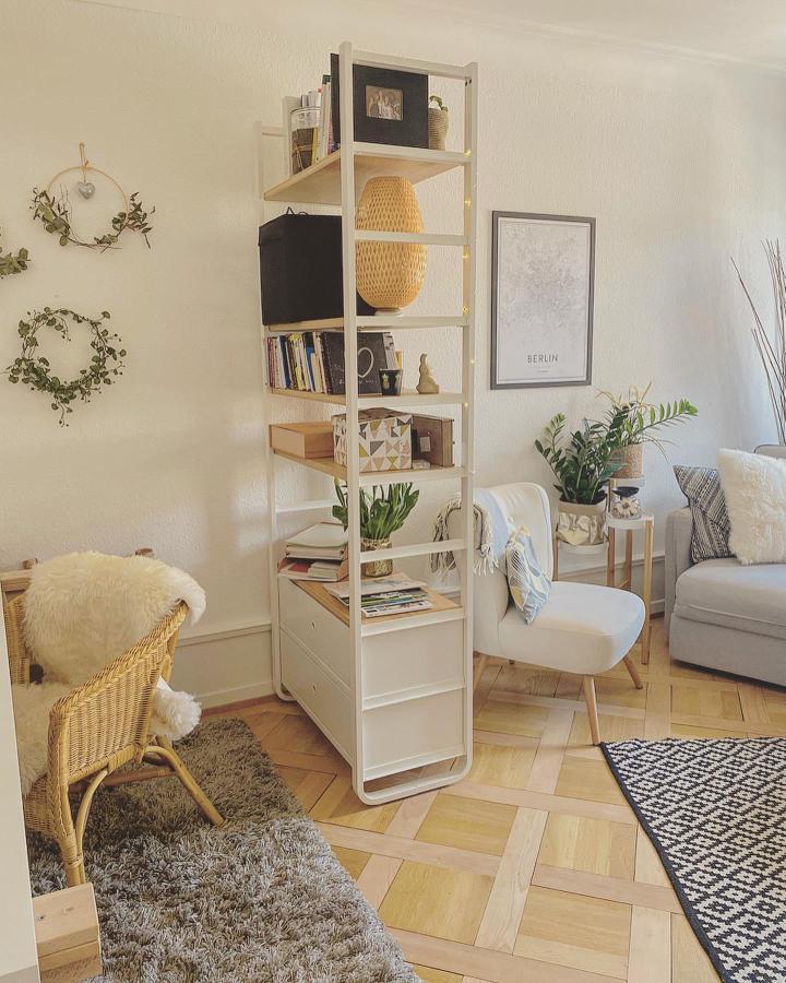 Cream open shelving room divider from @interioristique. ikea elvarli room divider ideas with plants and woven decor.