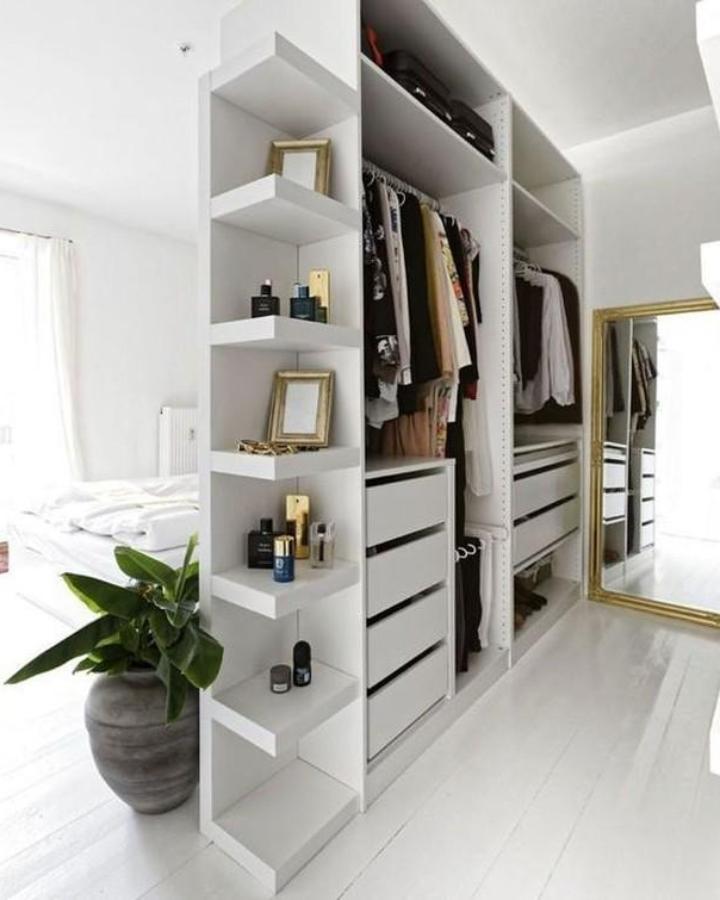 White PAX wardrobe room divider from @domesblissity. Open shelves, gold mirror, drawers, and organized clothing storage.