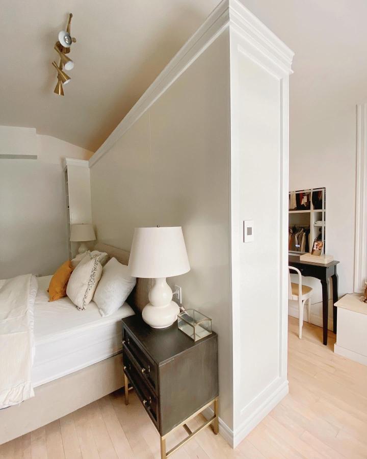 White built-in bedroom divider from @johannainteriors. Elegant ikea pax room divider ideas conceal a dressing area.