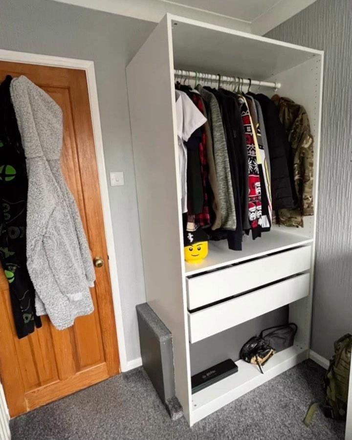 White IKEA PAX wardrobe from @family_life_lincolnshire. Open rail and drawers maximise compact bedroom storage.