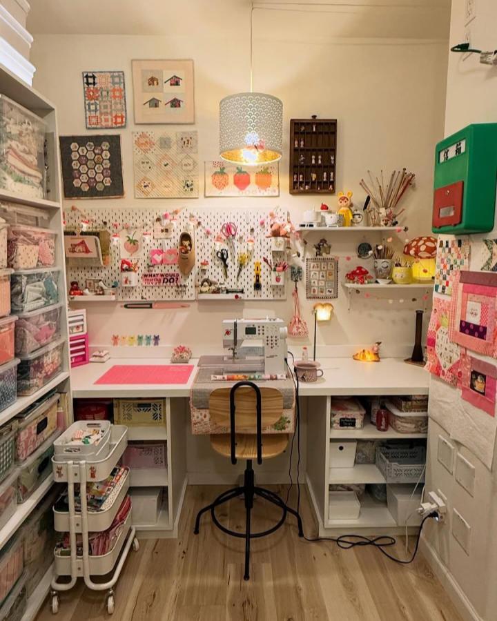 White pegboard craft room from @mushroommamacrafts. IKEA small craft room ideas with Rร
SKOG cart and colorful storage.