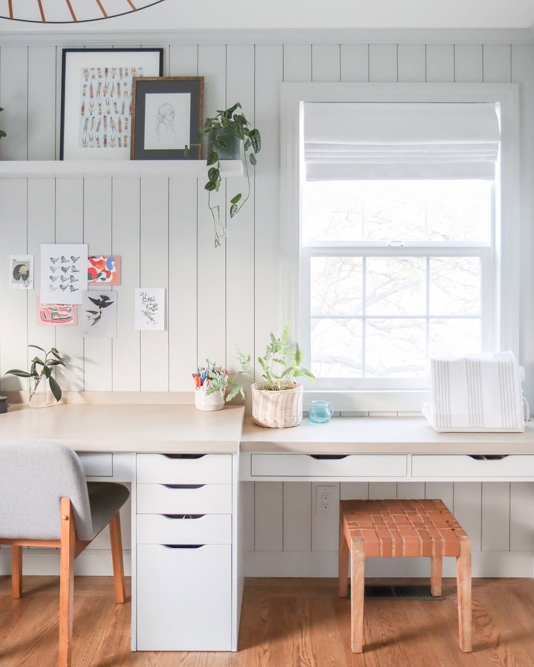 Bright plywood workspace with IKEA drawers, showcasing best desktops for ikea alex desks in a creative home office.