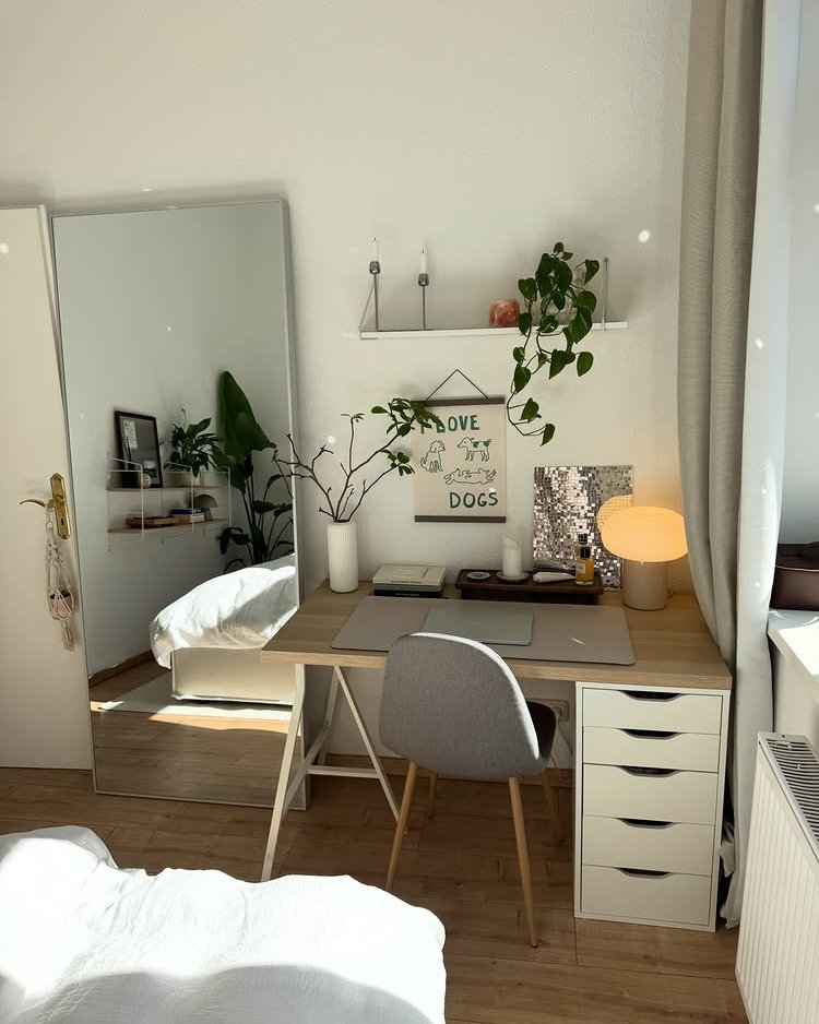 Warm LAGKAPTEN desktop paired with ALEX drawers in a bright Scandinavian bedroom workspace