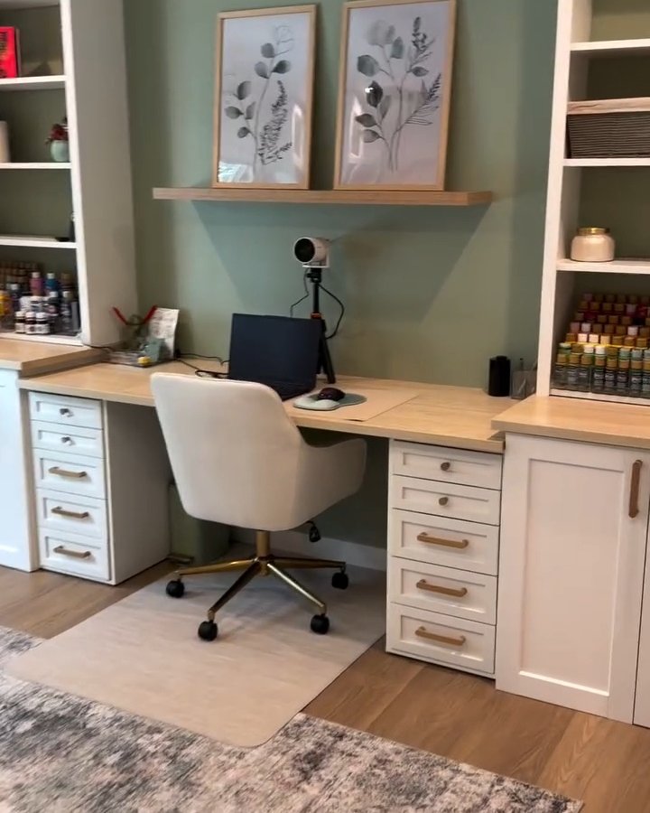 Custom EKBACKEN desktop spanning white IKEA ALEX drawer units in a creative craft room