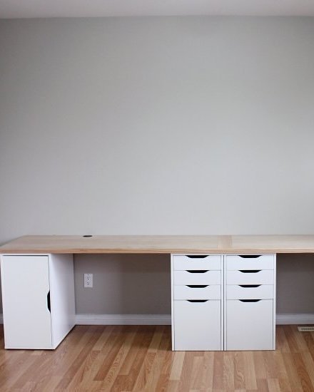 IKEA Alex desk setup with a wide wood desktop and white drawer units