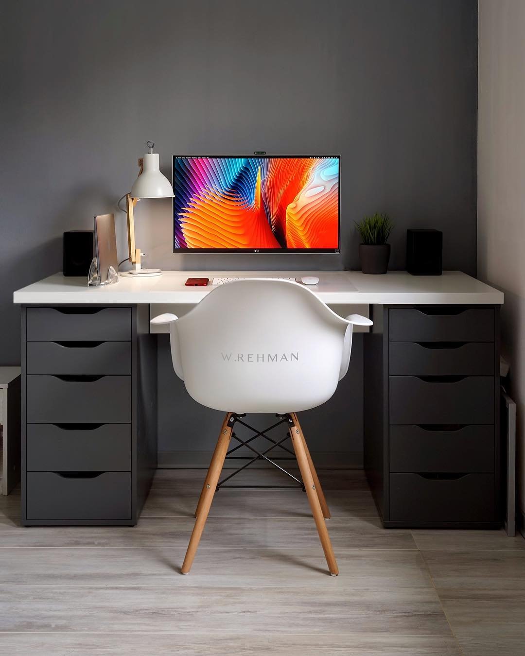 White LINNMON desktop paired with dark ALEX drawers in a refined home office