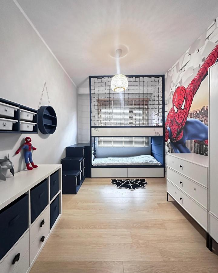 Navy DIY IKEA KURA bunk bed from @dom.pod.warszawa. Spiderman room, ikea kura bed ideas for boys, stairs and safety net.