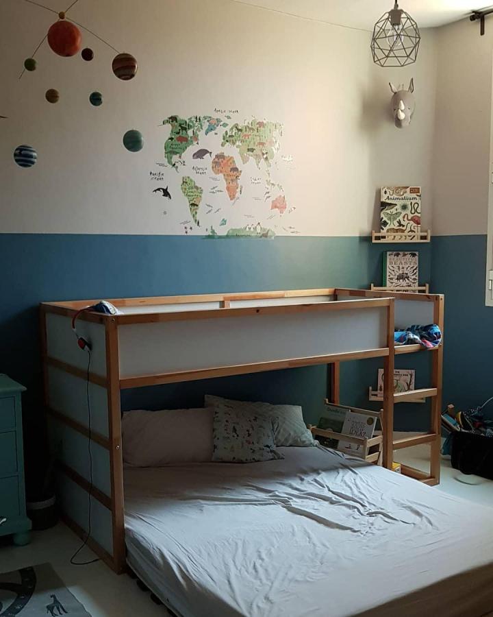 Natural wood loft bed from @the.colourful.home.rebel. Reversed frame with full-size bed underneath.