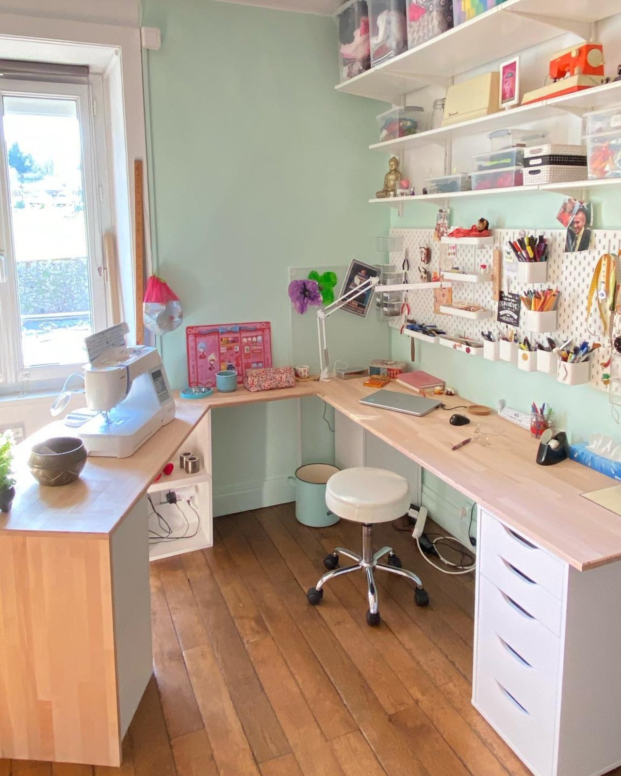 ikea skadis craft room ideas with pegboard storage, open shelving, and corner desk